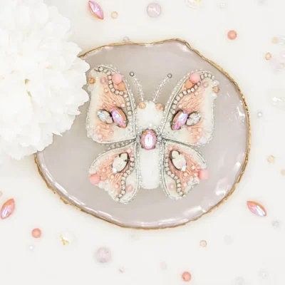 Handmade butterfly brooch pin by Fae Fancies, in ivory and peach color, Dreamy collection, silk velvet, hand-embroidery, front side