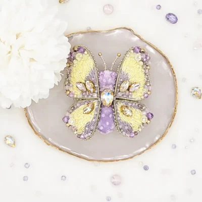 Handmade butterfly brooch pin by Fae Fancies, in purple and yellow color, Dreamy collection, silk velvet, hand-embroidery, front side