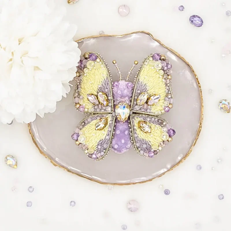 Handmade butterfly brooch pin by Fae Fancies, in purple and yellow color, Dreamy collection, silk velvet, hand-embroidery, front side